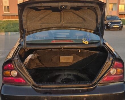 Черный Шевроле Эванда, объемом двигателя 2 л и пробегом 250 тыс. км за 4196 $, фото 12 на Automoto.ua