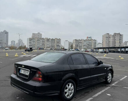 Чорний Шевроле Еванда, об'ємом двигуна 2 л та пробігом 299 тис. км за 3500 $, фото 1 на Automoto.ua