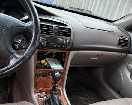 Черный Шевроле Эванда, объемом двигателя 2 л и пробегом 3 тыс. км за 2200 $, фото 2 на Automoto.ua