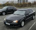 Черный Шевроле Эванда, объемом двигателя 2 л и пробегом 350 тыс. км за 3400 $, фото 1 на Automoto.ua