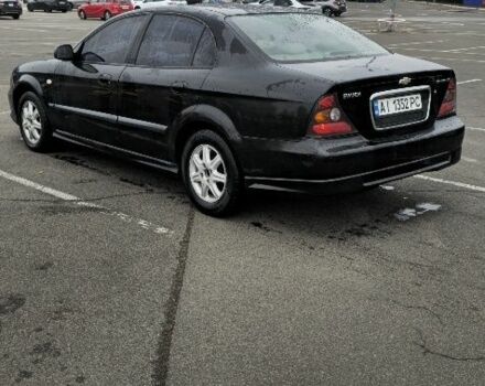 Черный Шевроле Эванда, объемом двигателя 2 л и пробегом 350 тыс. км за 3400 $, фото 2 на Automoto.ua