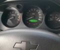 Чорний Шевроле Еванда, об'ємом двигуна 2 л та пробігом 160 тис. км за 4900 $, фото 11 на Automoto.ua