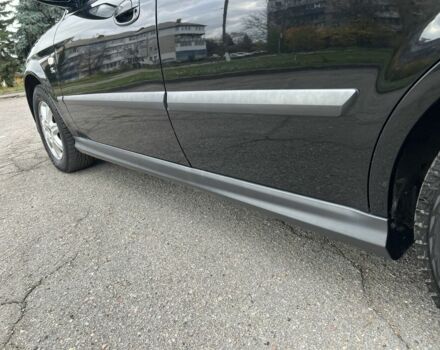 Черный Шевроле Эванда, объемом двигателя 2 л и пробегом 193 тыс. км за 4200 $, фото 23 на Automoto.ua