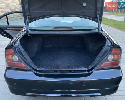 Черный Шевроле Эванда, объемом двигателя 2 л и пробегом 256 тыс. км за 4199 $, фото 7 на Automoto.ua