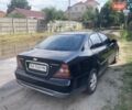 Черный Шевроле Эванда, объемом двигателя 2 л и пробегом 400 тыс. км за 3600 $, фото 1 на Automoto.ua