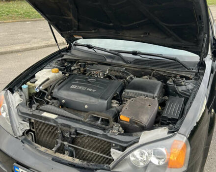 Черный Шевроле Эванда, объемом двигателя 2 л и пробегом 193 тыс. км за 4200 $, фото 29 на Automoto.ua