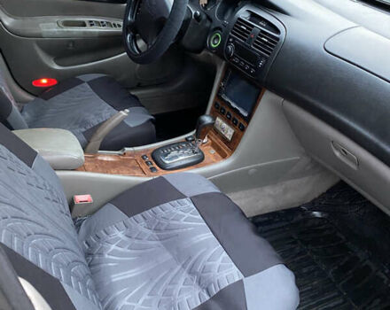 Чорний Шевроле Еванда, об'ємом двигуна 2 л та пробігом 181 тис. км за 5000 $, фото 12 на Automoto.ua