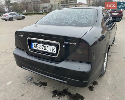 Чорний Шевроле Еванда, об'ємом двигуна 2 л та пробігом 235 тис. км за 3500 $, фото 44 на Automoto.ua