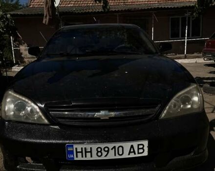 Чорний Шевроле Еванда, об'ємом двигуна 2 л та пробігом 150 тис. км за 3800 $, фото 1 на Automoto.ua
