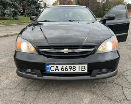 Черный Шевроле Эванда, объемом двигателя 2 л и пробегом 193 тыс. км за 4200 $, фото 21 на Automoto.ua