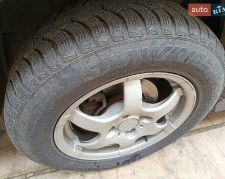 Черный Шевроле Эванда, объемом двигателя 2 л и пробегом 207 тыс. км за 4436 $, фото 9 на Automoto.ua