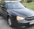 Чорний Шевроле Еванда, об'ємом двигуна 2 л та пробігом 370 тис. км за 2915 $, фото 1 на Automoto.ua