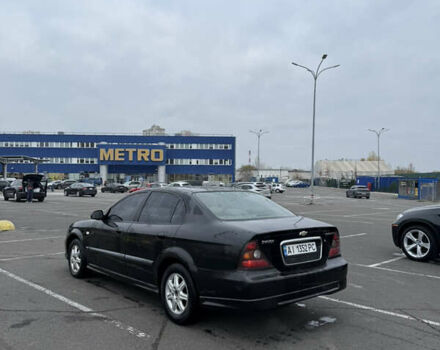 Чорний Шевроле Еванда, об'ємом двигуна 2 л та пробігом 299 тис. км за 3500 $, фото 2 на Automoto.ua