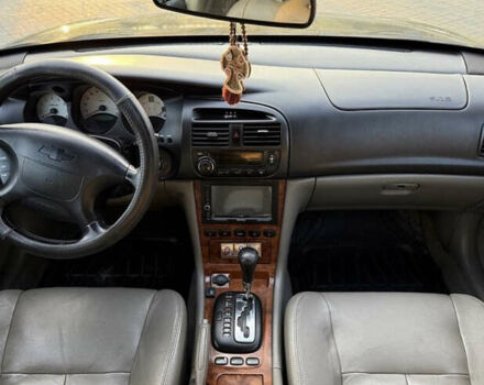 Чорний Шевроле Еванда, об'ємом двигуна 2 л та пробігом 181 тис. км за 5000 $, фото 2 на Automoto.ua