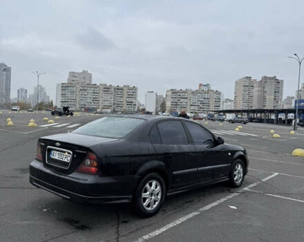 Чорний Шевроле Еванда, об'ємом двигуна 2 л та пробігом 299 тис. км за 3500 $, фото 13 на Automoto.ua