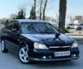Чорний Шевроле Еванда, об'ємом двигуна 2 л та пробігом 250 тис. км за 3400 $, фото 1 на Automoto.ua