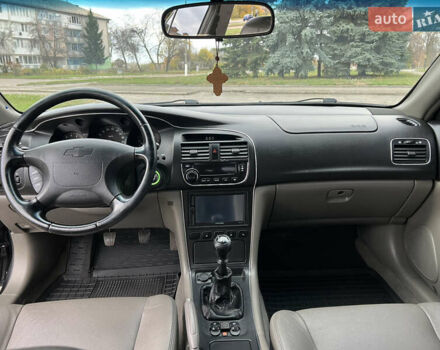 Черный Шевроле Эванда, объемом двигателя 2 л и пробегом 193 тыс. км за 4200 $, фото 12 на Automoto.ua