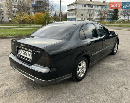 Черный Шевроле Эванда, объемом двигателя 2 л и пробегом 193 тыс. км за 4200 $, фото 5 на Automoto.ua
