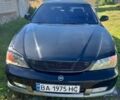 Чорний Шевроле Еванда, об'ємом двигуна 2 л та пробігом 221 тис. км за 3000 $, фото 1 на Automoto.ua