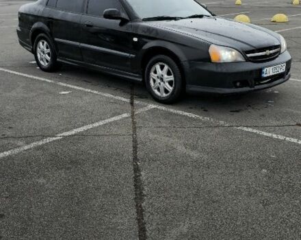 Черный Шевроле Эванда, объемом двигателя 2 л и пробегом 350 тыс. км за 3400 $, фото 1 на Automoto.ua