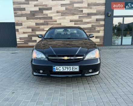 Черный Шевроле Эванда, объемом двигателя 2 л и пробегом 256 тыс. км за 4199 $, фото 1 на Automoto.ua