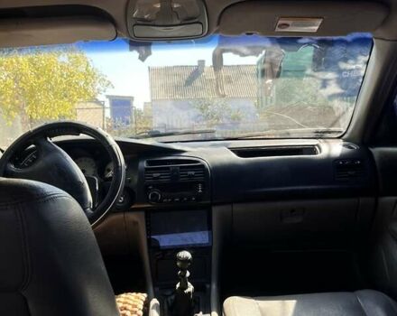 Чорний Шевроле Еванда, об'ємом двигуна 2 л та пробігом 150 тис. км за 3800 $, фото 5 на Automoto.ua