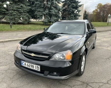 Черный Шевроле Эванда, объемом двигателя 2 л и пробегом 193 тыс. км за 4200 $, фото 1 на Automoto.ua