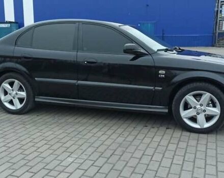 Черный Шевроле Эванда, объемом двигателя 2.49 л и пробегом 298 тыс. км за 3999 $, фото 3 на Automoto.ua