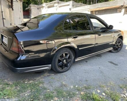 Черный Шевроле Эванда, объемом двигателя 2.5 л и пробегом 290 тыс. км за 1999 $, фото 2 на Automoto.ua