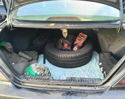 Черный Шевроле Эванда, объемом двигателя 2.5 л и пробегом 215 тыс. км за 3114 $, фото 3 на Automoto.ua