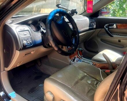 Черный Шевроле Эванда, объемом двигателя 2.5 л и пробегом 303 тыс. км за 3400 $, фото 1 на Automoto.ua