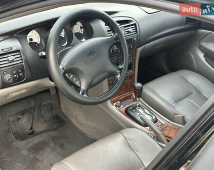 Черный Шевроле Эванда, объемом двигателя 2.5 л и пробегом 165 тыс. км за 3499 $, фото 8 на Automoto.ua