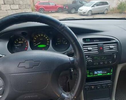 Черный Шевроле Эванда, объемом двигателя 2 л и пробегом 220 тыс. км за 4000 $, фото 9 на Automoto.ua