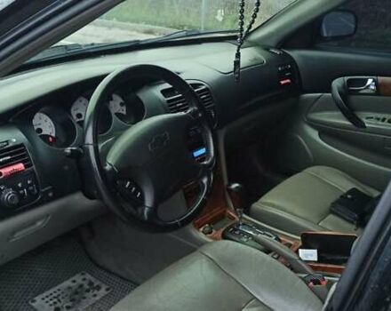 Черный Шевроле Эванда, объемом двигателя 2.49 л и пробегом 298 тыс. км за 3999 $, фото 1 на Automoto.ua