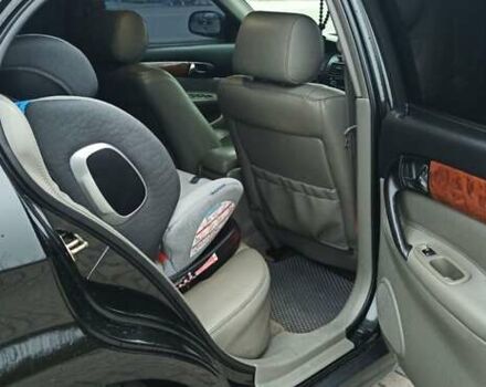 Черный Шевроле Эванда, объемом двигателя 2.49 л и пробегом 298 тыс. км за 3999 $, фото 12 на Automoto.ua