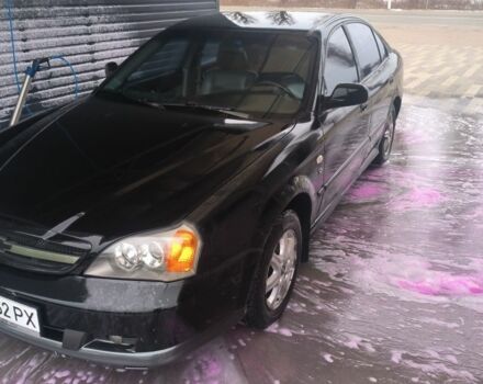 Черный Шевроле Эванда, объемом двигателя 2 л и пробегом 180 тыс. км за 3000 $, фото 4 на Automoto.ua