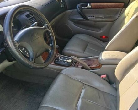 Черный Шевроле Эванда, объемом двигателя 2.5 л и пробегом 215 тыс. км за 3114 $, фото 10 на Automoto.ua