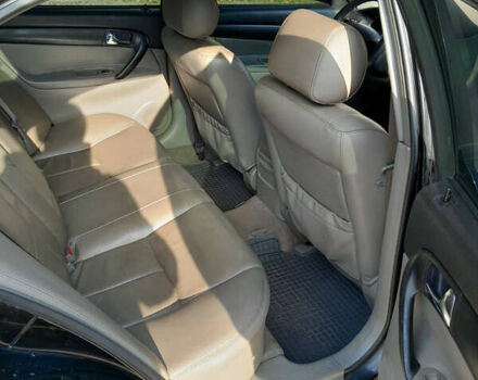 Черный Шевроле Эванда, объемом двигателя 2 л и пробегом 260 тыс. км за 4150 $, фото 5 на Automoto.ua