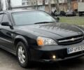 Чорний Шевроле Еванда, об'ємом двигуна 2 л та пробігом 303 тис. км за 2750 $, фото 1 на Automoto.ua