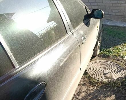 Черный Шевроле Эванда, объемом двигателя 2.5 л и пробегом 215 тыс. км за 3114 $, фото 2 на Automoto.ua