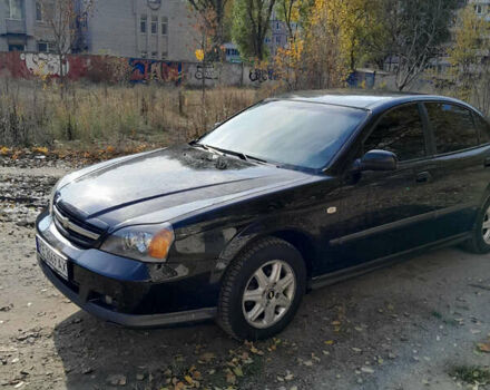 Черный Шевроле Эванда, объемом двигателя 2 л и пробегом 260 тыс. км за 4150 $, фото 8 на Automoto.ua