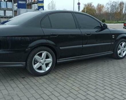 Черный Шевроле Эванда, объемом двигателя 2.49 л и пробегом 298 тыс. км за 3999 $, фото 4 на Automoto.ua