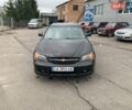 Черный Шевроле Эванда, объемом двигателя 2 л и пробегом 170 тыс. км за 2350 $, фото 1 на Automoto.ua