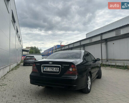 Чорний Шевроле Еванда, об'ємом двигуна 2 л та пробігом 472 тис. км за 2999 $, фото 7 на Automoto.ua