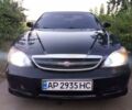 Чорний Шевроле Еванда, об'ємом двигуна 2 л та пробігом 355 тис. км за 5000 $, фото 1 на Automoto.ua