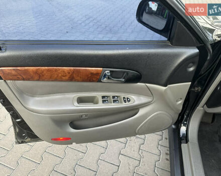 Черный Шевроле Эванда, объемом двигателя 2.5 л и пробегом 165 тыс. км за 3499 $, фото 10 на Automoto.ua