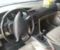 Чорний Шевроле Еванда, об'ємом двигуна 2 л та пробігом 142 тис. км за 5600 $, фото 1 на Automoto.ua
