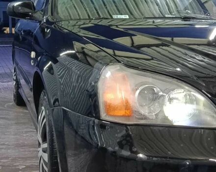 Чорний Шевроле Еванда, об'ємом двигуна 2 л та пробігом 36 тис. км за 3600 $, фото 5 на Automoto.ua