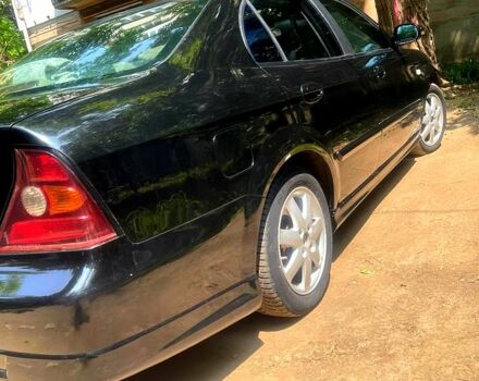 Черный Шевроле Эванда, объемом двигателя 2.5 л и пробегом 303 тыс. км за 3400 $, фото 8 на Automoto.ua