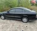 Чорний Шевроле Еванда, об'ємом двигуна 2 л та пробігом 185 тис. км за 3900 $, фото 1 на Automoto.ua